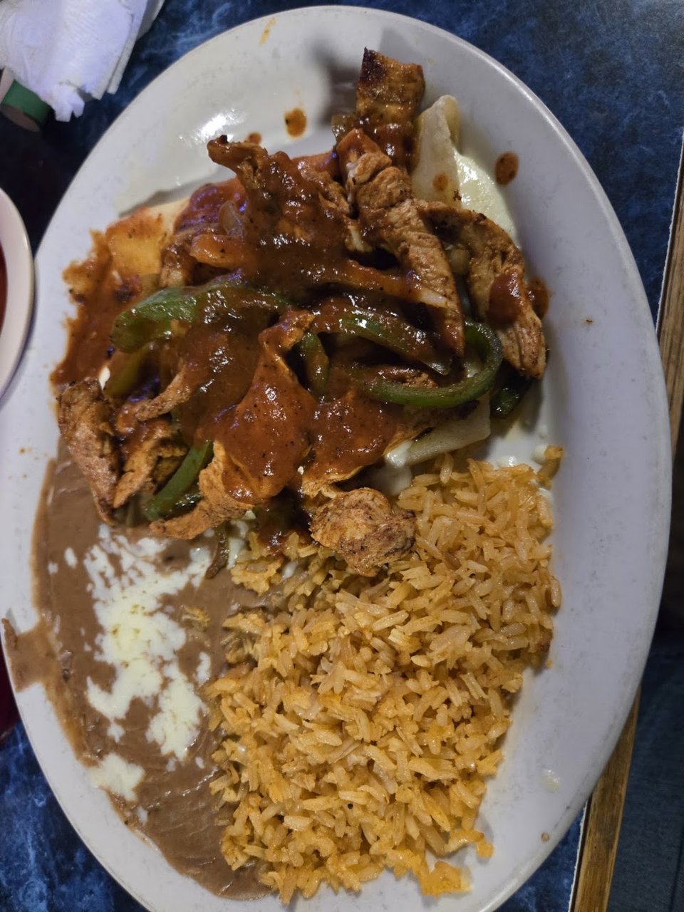 Restaurant menu listing tacos, enchiladas, and shrimp.